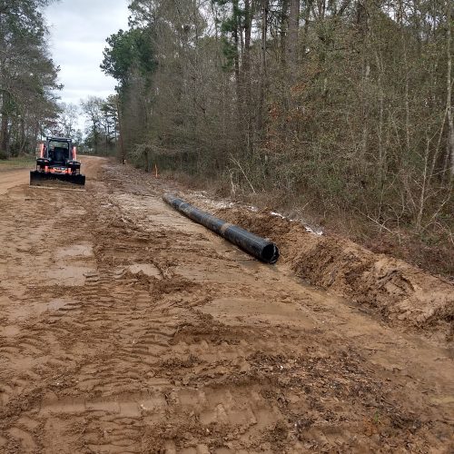 Placing Culverts After Digging Ditch