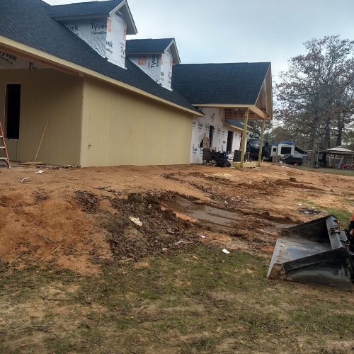 Dirt Built Up Too High Around Home (Before Correction)